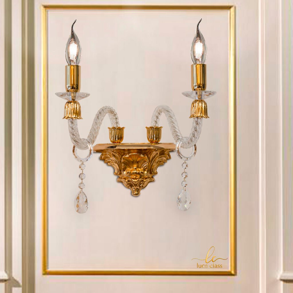 Applique bracci cristallo tortiglione a 2 luci con base dorata in ottone.